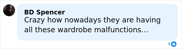 Pro wrestler Kiana James reacting during an awkward wardrobe malfunction on live TV in a wrestling ring setting.