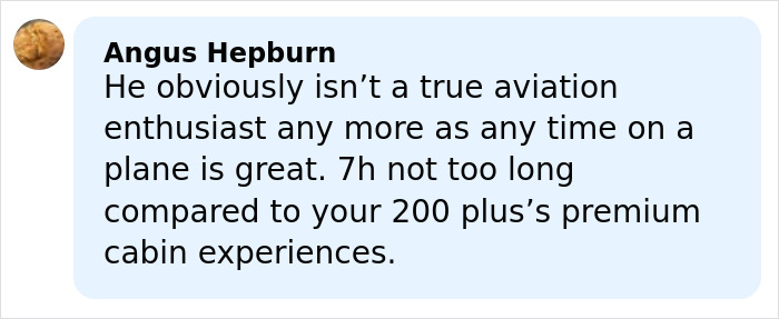 Comment by Angus Hepburn discussing an aviation enthusiast’s preference for premium cabin over economy during a flight.