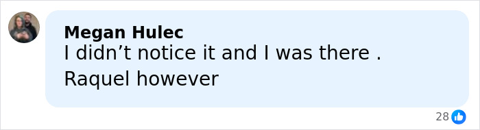 Pro wrestler Kiana James reacting to an awkward wardrobe malfunction during a live TV broadcast.