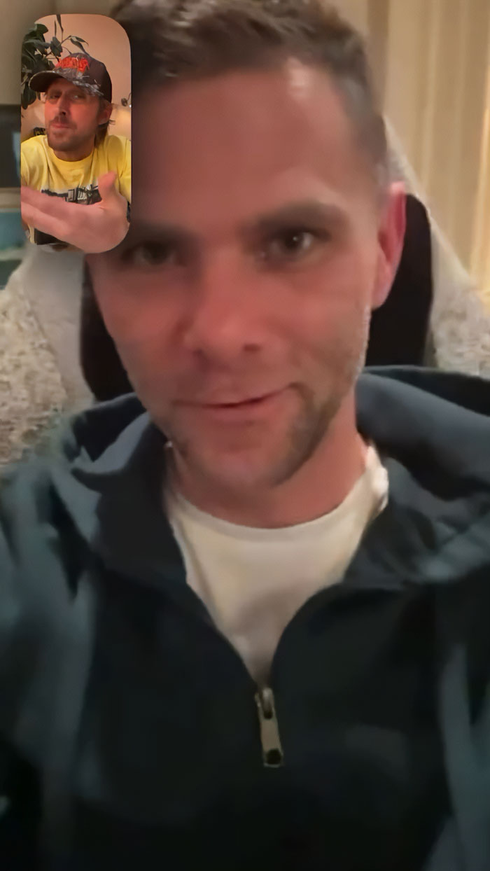 Mikey Day on phone call with blurred background, sharing a casual moment that sparked Ryan Gosling fan reactions.