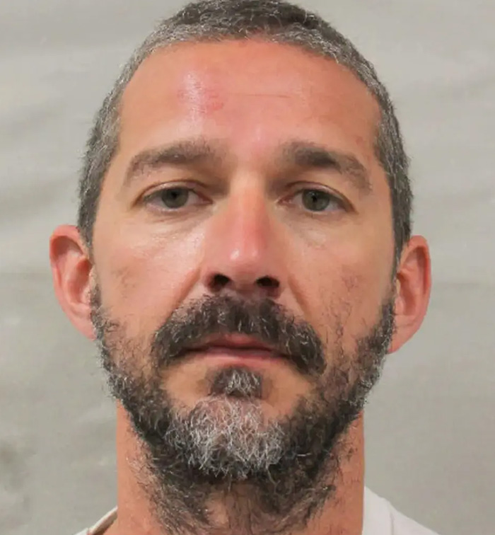 Shia LaBeouf close-up photo showing serious expression, related to Mardi Gras arrest and mental health issues.