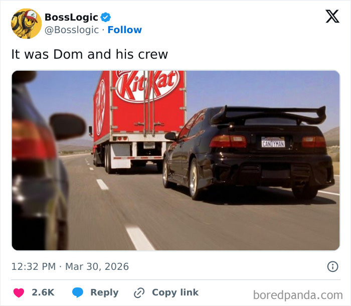 Black car with license plate reading CANDYMAN following a large KitKat truck on a highway referencing KitKat theft responses.