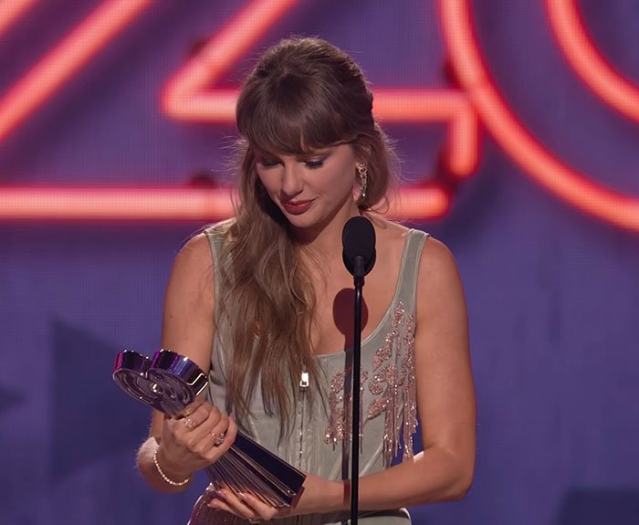 Taylor Swift And Travis Kelce's "Awkward" Appearance At iHeartMusic Awards Sparks Wild Fan Theories