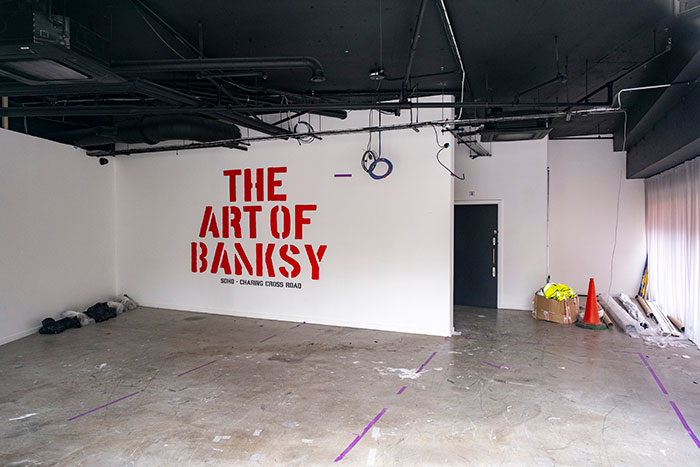 Fãs de Banksy convencidos de que sua arte cairá em valor depois que uma investigação bombástica desmascarou sua verdadeira identidade