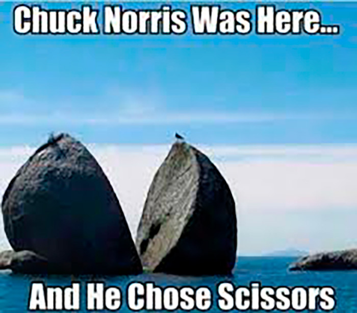 Split rock against a blue sky with text referencing Chuck Norris memes as fans pay tribute to the late icon.