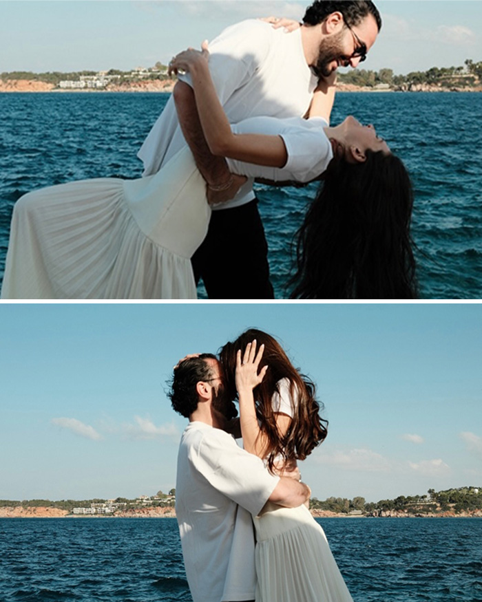 Couple embracing romantically by the sea during a Greek proposal featuring the most beautiful girl in the world.