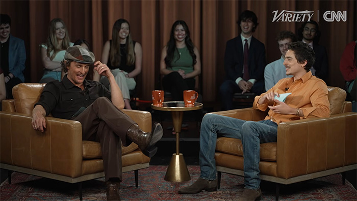 Actor Timoth&eacute;e Chalamet laughing during an interview amid rising backlash over his opera and ballet comments.