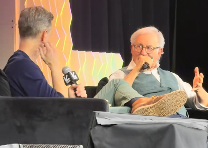 Steven Spielberg speaking into microphone during interview, discussing Timoth&eacute;e Chalamet ahead of the Oscars event.