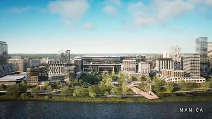 A modern cityscape with high-rise buildings near a river, illustrating human neurological development in adulthood.