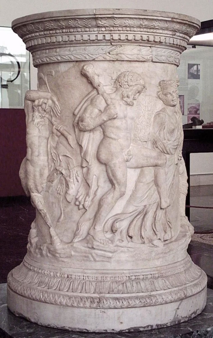 Marble ancient sculpture depicting human figures, symbolizing the concept of humans neurologically entering adulthood.