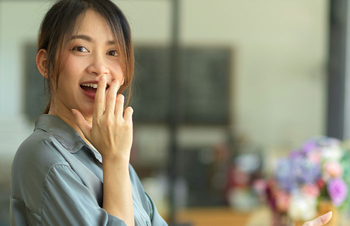 Young woman reacting with surprise, illustrating one-in-a-million stories people actually lived through but others doubt.