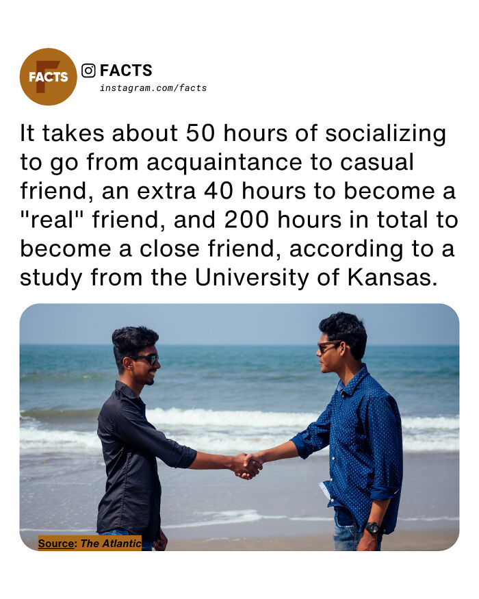 Two men shaking hands on a beach, illustrating interesting facts about socializing for daily brain-care.