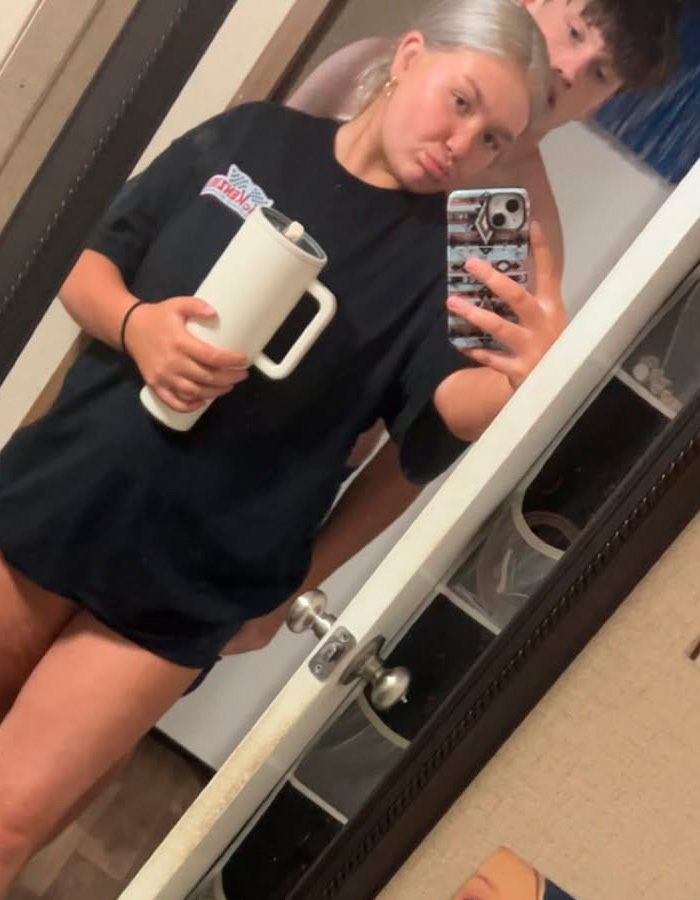 Teen girl and boy taking mirror selfie, linked to controversial case involving 15-year-old pregnant by 12-year-old update.