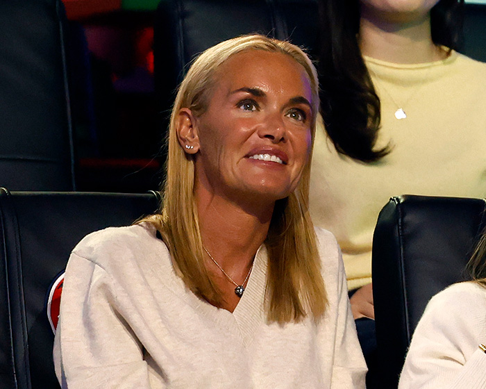 Vanessa Trump attending an event, looking thoughtful, linked to Tiger Woods DUI arrest and ultimatum news.