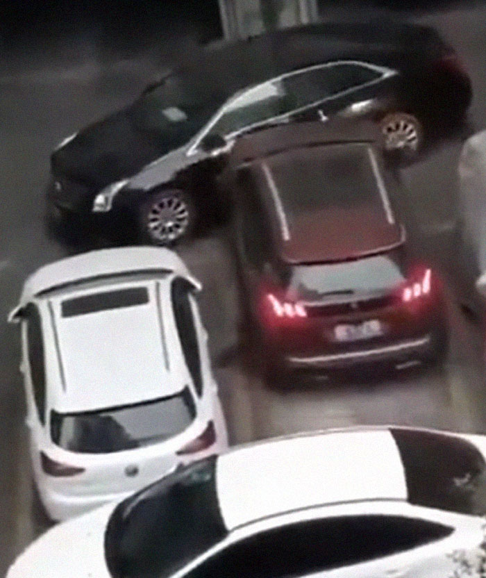 Multiple cars involved in parking disaster showing what could go wrong in tight spaces leading to collision mishaps.