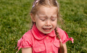 Dad Furious After Wife Hurls Their Daughter Over A Fence To Save Her From A Charging Dog