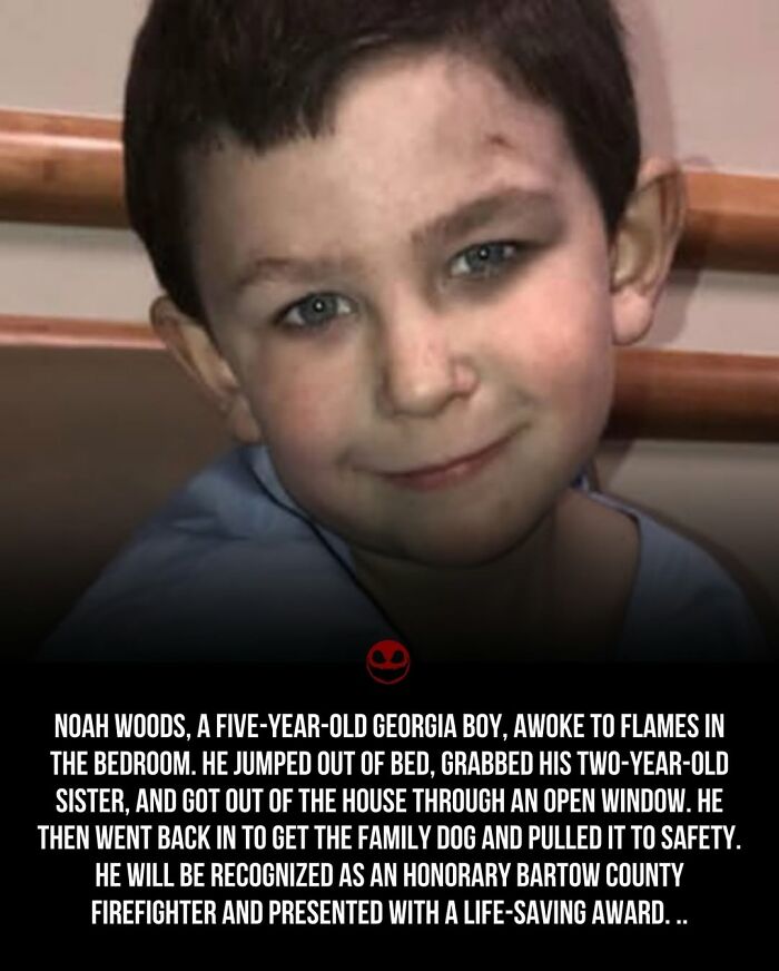 Close-up of a young boy with blue eyes smiling, featured in weird and odd facts and photos collection.