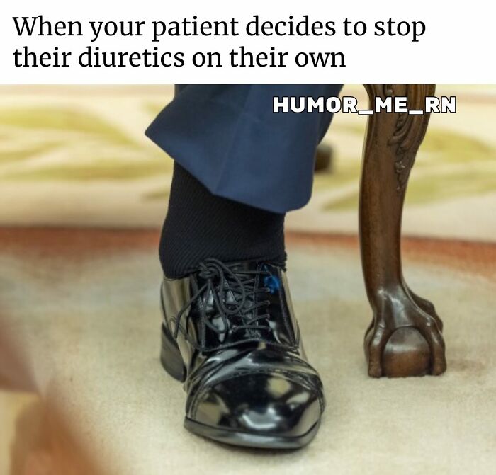 Close-up of a polished black dress shoe next to a wooden chair leg, illustrating a funny healthcare meme scenario.