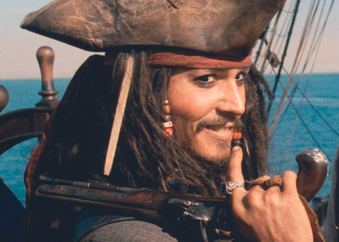 Actor dressed as a pirate on a ship, symbolizing confrontation linked to Brian C*x backlash over his remarks.