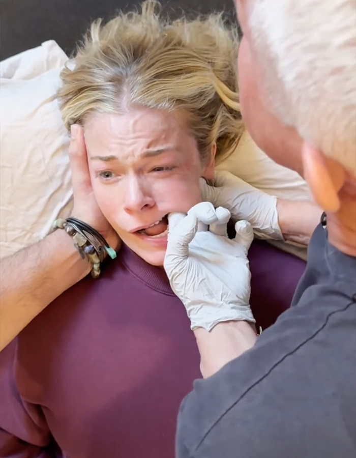 LeAnn Rimes receiving jaw release therapy, showing an emotional response during the treatment session.