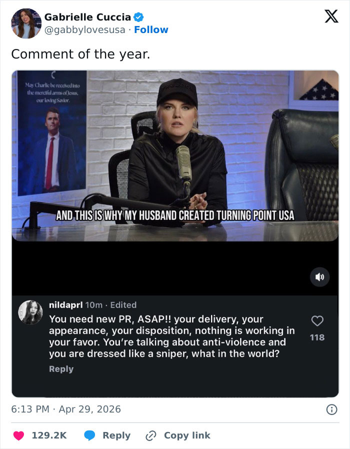 Erika Kirk in a controversial video, wearing a black top and hat, with a comment criticizing her appearance and delivery.