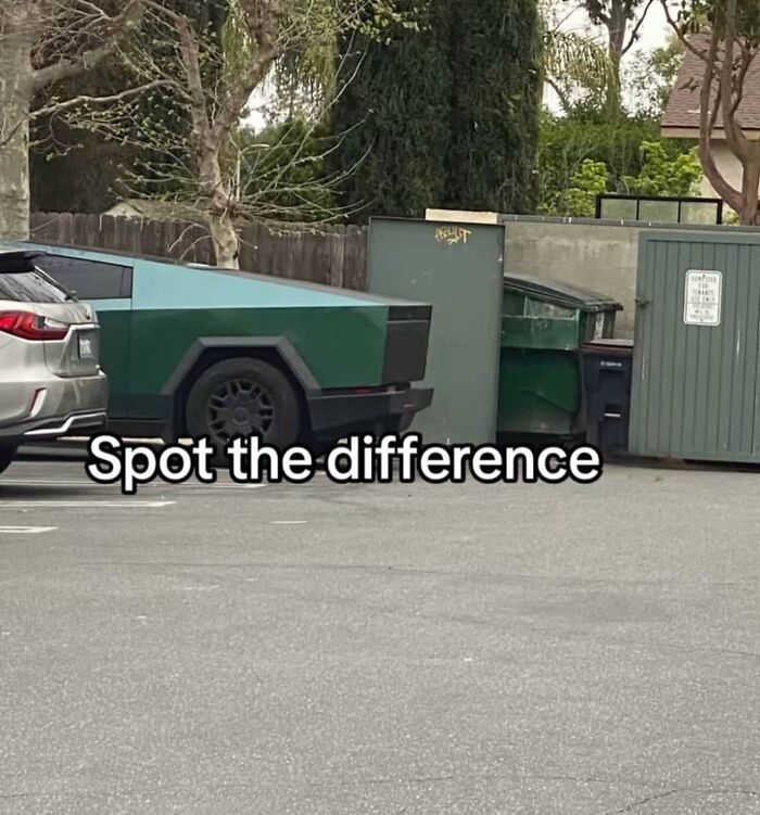 A green Cybertruck parked next to dumpsters, creating an unhinged and hilarious visual illusion. Spot the difference?
