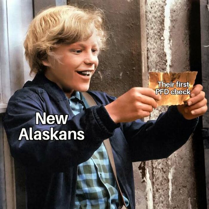 A meme showing Charlie Bucket looking thrilled, representing new Alaskans receiving their first PFD check. Alaska memes.