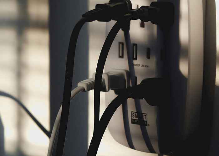 Power strip with multiple plugs connected, illustrating common household items that are more dangerous than they seem.