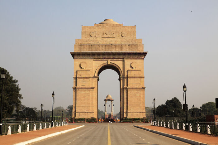 India Gate, a historic monument in New Delhi, representing a country often ranked for its work-life balance.