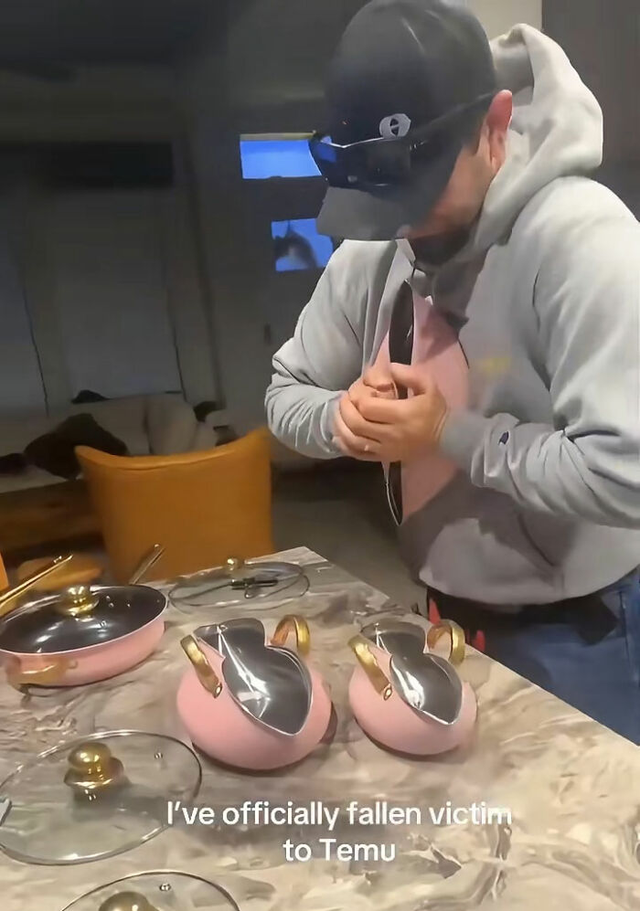 Person reacting to mismatched pink cookware after ordering from Temu, illustrating a funny Temu shopping experience.