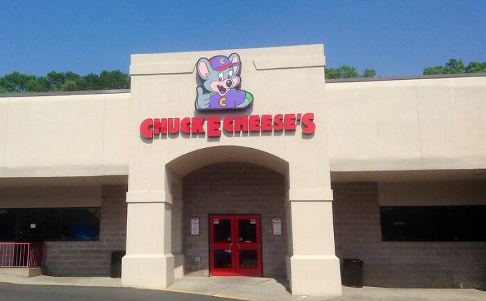 Chuck E Cheese's exterior entrance with logo, relating to wild times employees said I need to quit this job immediately.