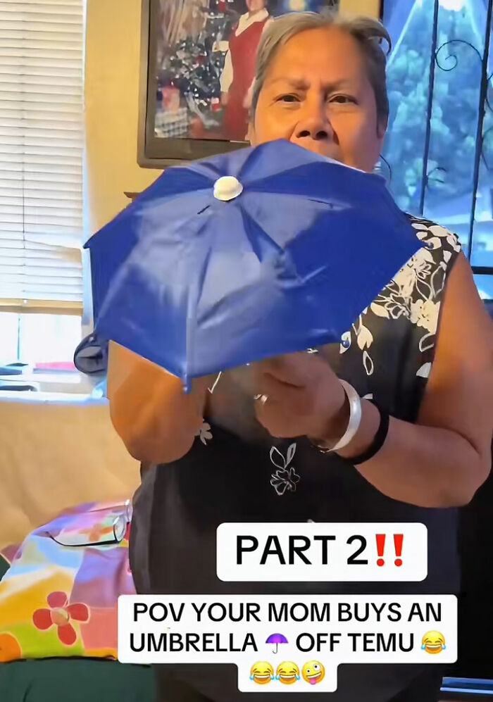 Older woman holding a tiny umbrella bought from Temu, showing a funny unexpected result from online shopping.