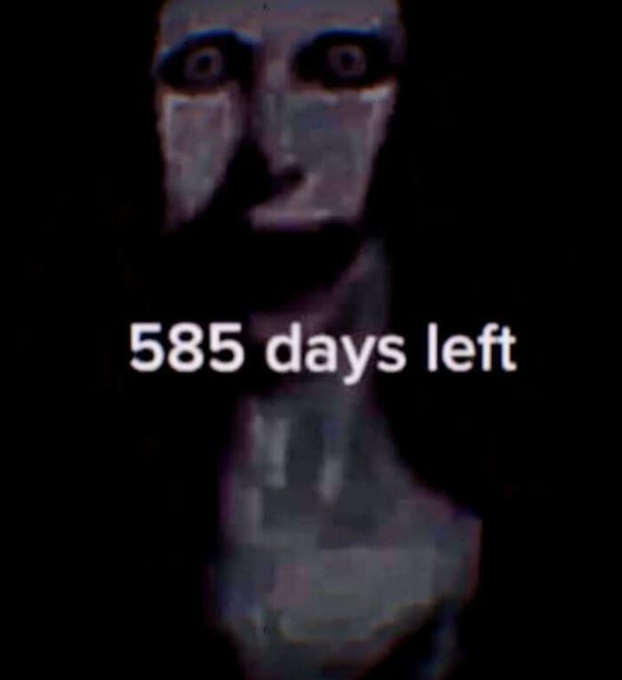 Creepy and confusing unhinged image showing a distorted figure with text 585 days left in dark background.