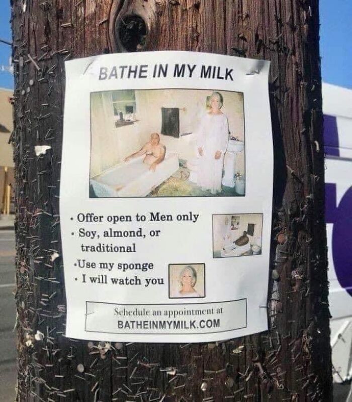 Flyer on a pole offering men to bathe in soy, almond, or traditional milk with a sponge and supervision.