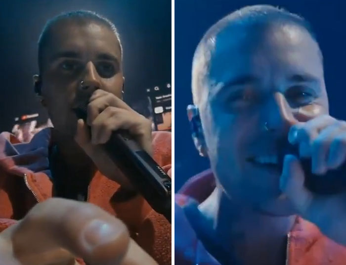 Close-up of a performer at Coachella 2026, engaging the crowd with a microphone during a memorable festival moment.