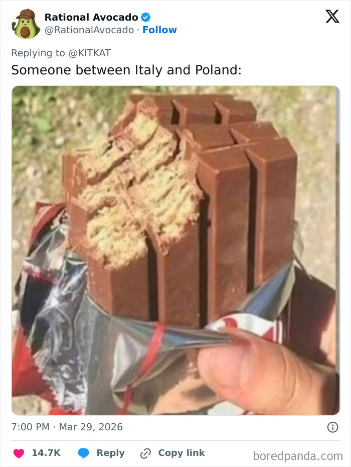 Partially eaten KitKat chocolate bar held in hand, related to stolen KitKat tracker campaign.