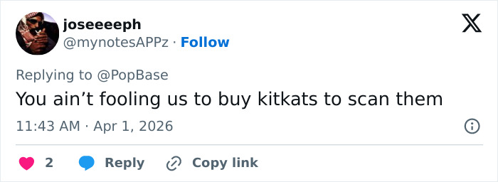 Tweet on a phone screen showing a user replying about kitkats and mentioning the stolen KitKat tracker campaign.