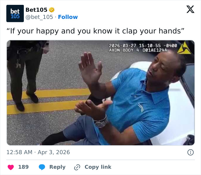 Bodycam image showing man in blue shirt with hands raised during Tiger Woods arrest footage, sparking hilarious online responses.