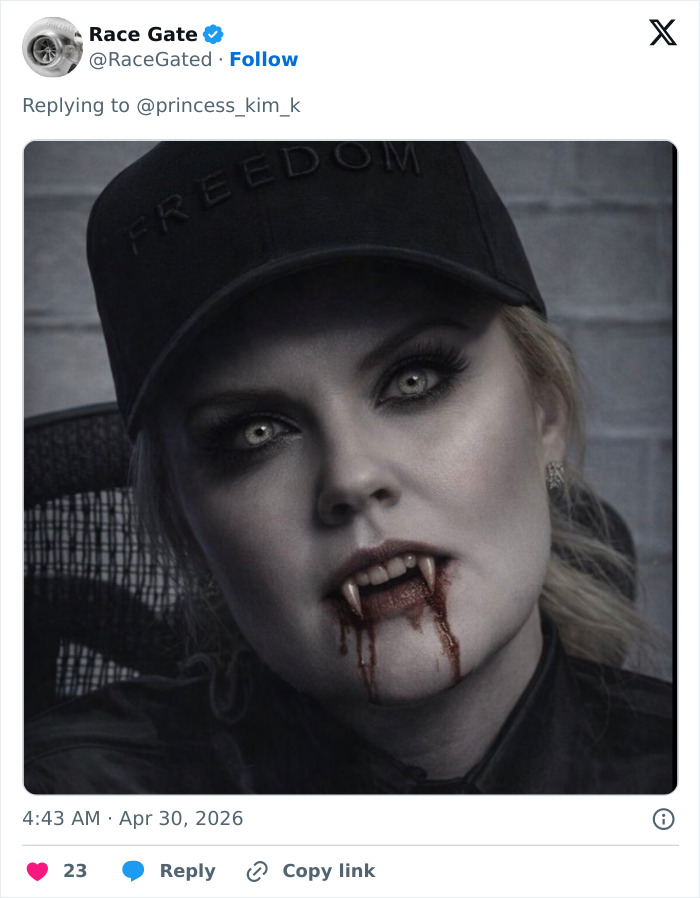 Erika Kirk depicted as a vampire with blood dripping from her fangs, wearing a black FREEDOM cap, after her controversial video.
