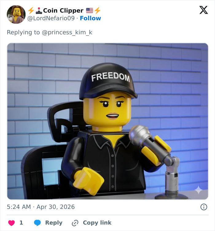 A Lego Erika Kirk figure with a "FREEDOM" hat speaking into a microphone, after Erika Kirk breaks silence.