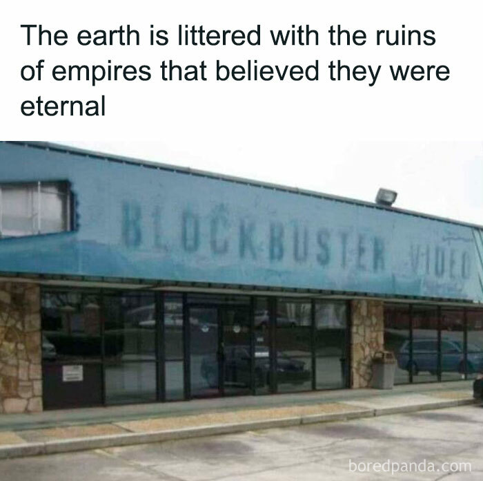 Abandoned Blockbuster video store with meme about the earth littered with ruins, highlighting relatable humor and life struggles.