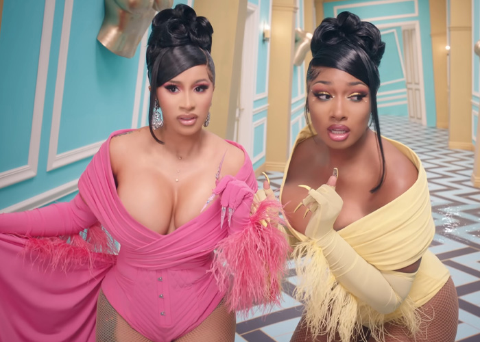 Cardi B in pink and Megan Thee Stallion in yellow with dramatic nails. Recalling things from 6 years ago that sound unreal.