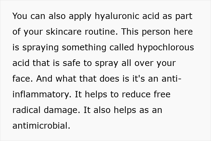 Person spraying hypochlorous acid on face as part of skincare routine addressing office air concerns and skin inflammation.