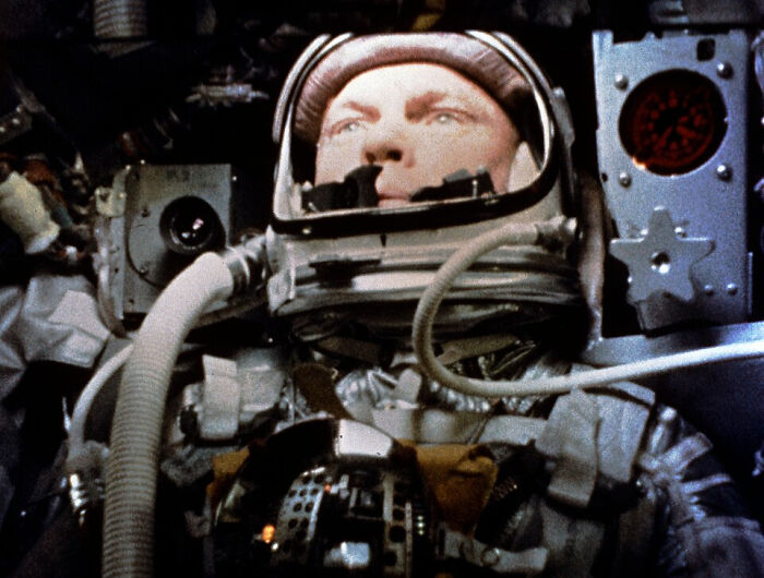 Astronaut inside a spacecraft suit, representing significant events from 1960 to 2010 in the year you were born.