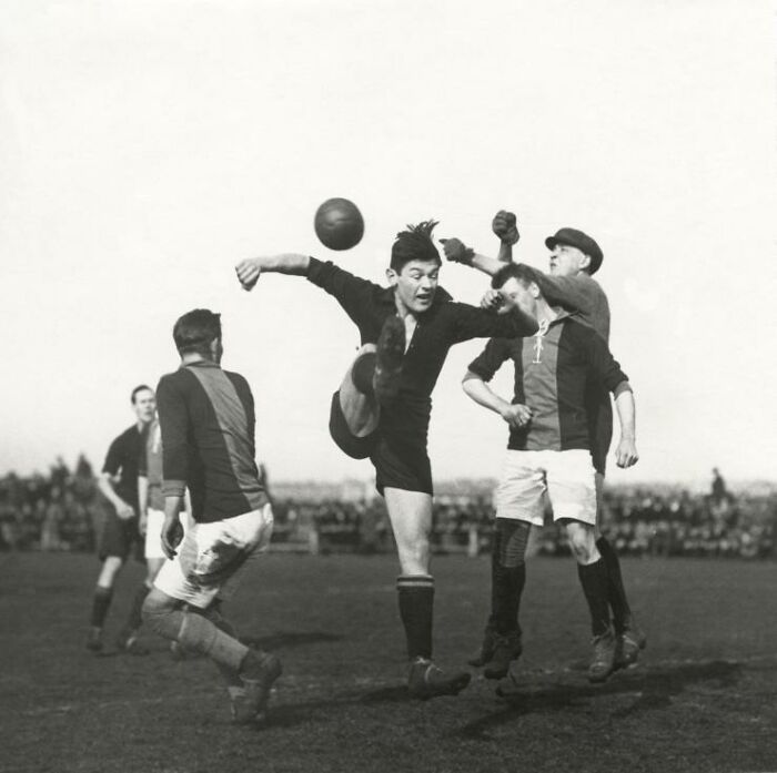 Vintage rare and interesting photo of an early 20th-century soccer match capturing dynamic action on the field.