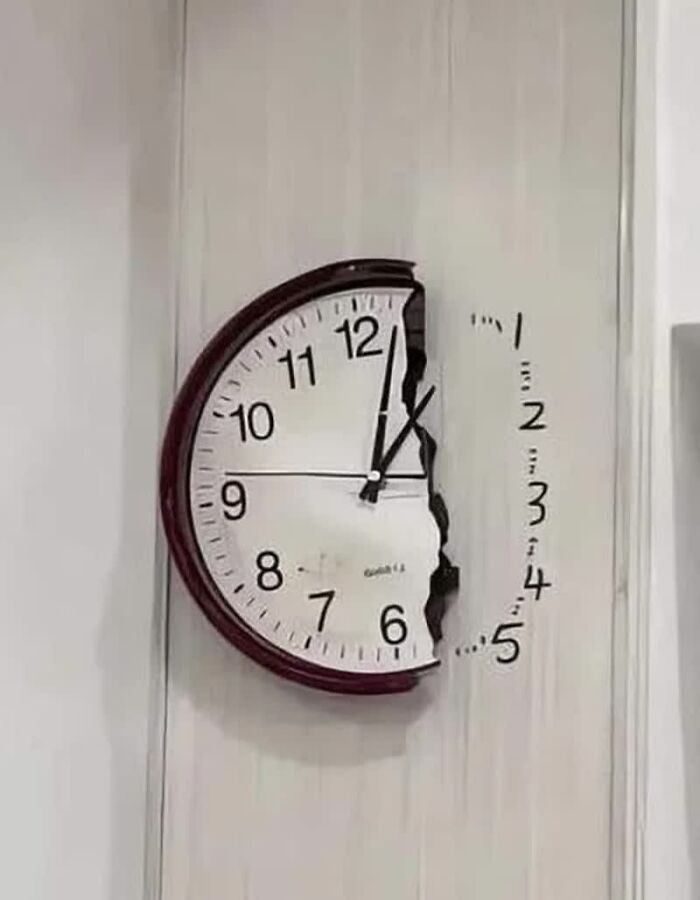 A weird image of a partially broken wall clock, with numbers 1-5 seemingly falling off. This is one of the weird images that made people go hmmm.