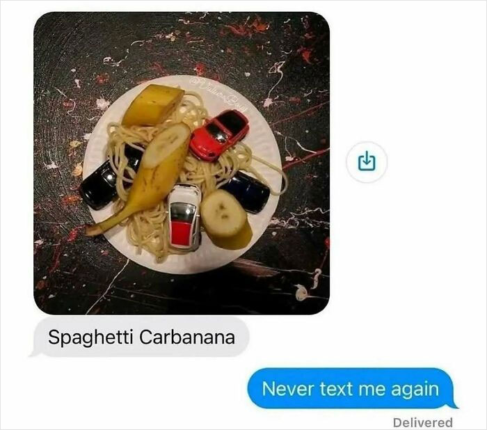 Plate with spaghetti, banana slices, and toy cars, illustrating a wild and unhinged meme for daily humor boost.