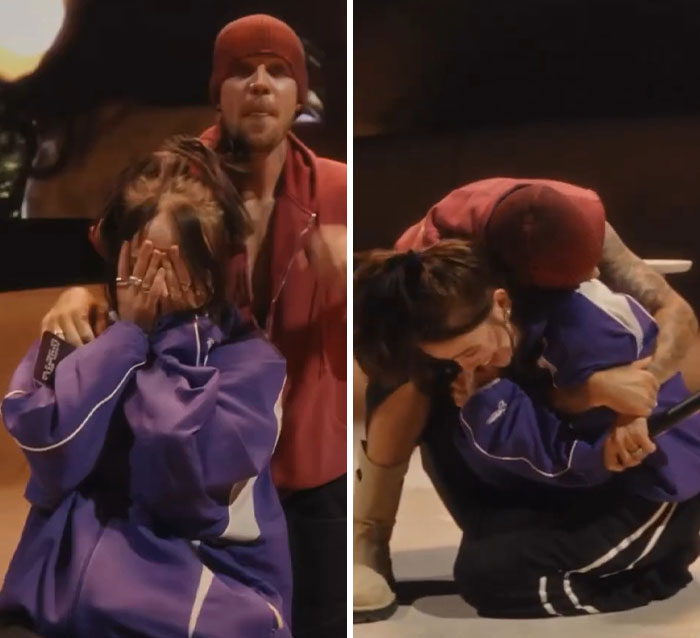 Two people interacting closely, one in a purple outfit, showcasing Coachella Weekend 2's biggest fashion fails.