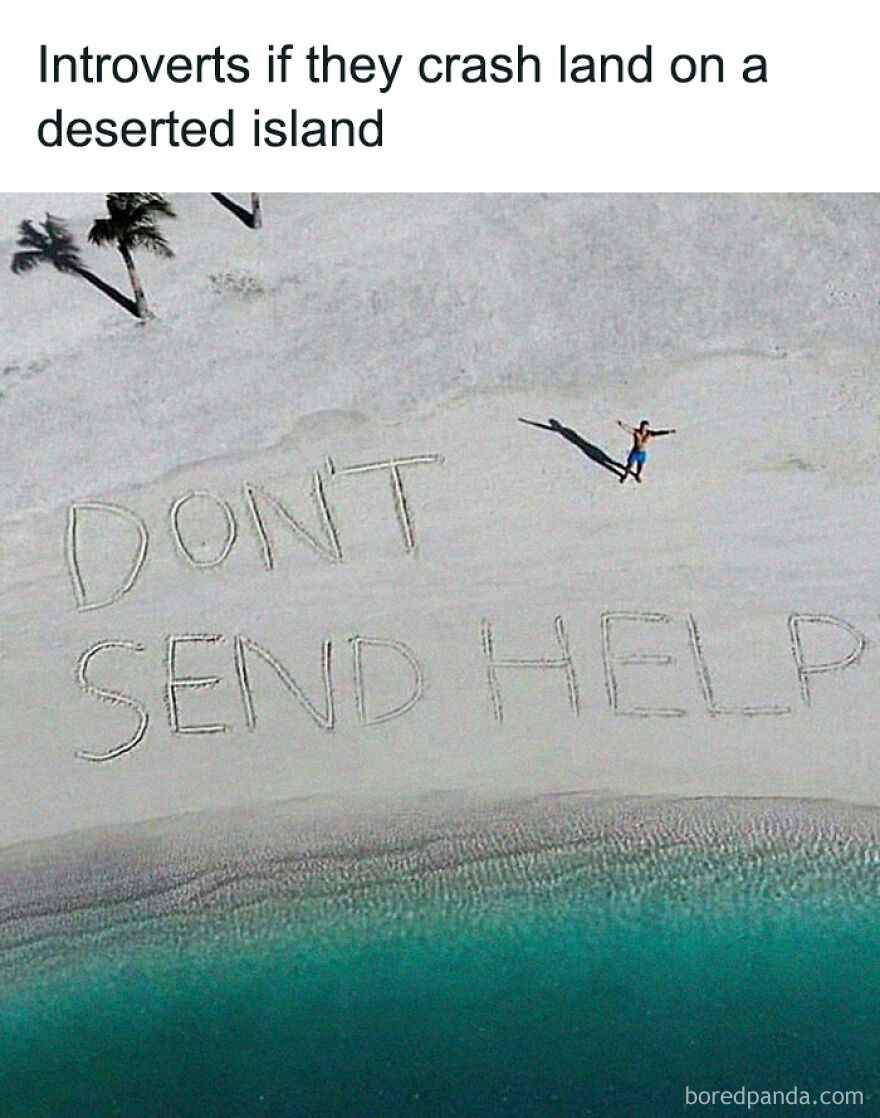 Funny introvert meme: Man lying on a deserted island beach, writing DONT SEND HELP in the sand. Relatable memes.