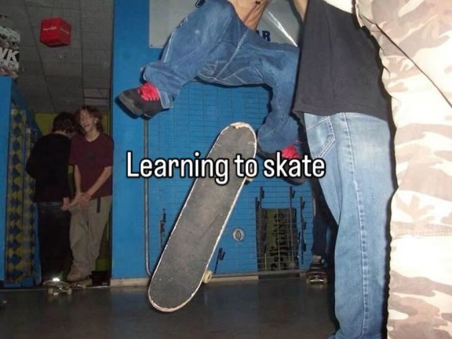A person mid-air doing a trick on a skateboard. Other teens in the background. A nostalgic photo capturing the vibe of growing up in the 2000s.